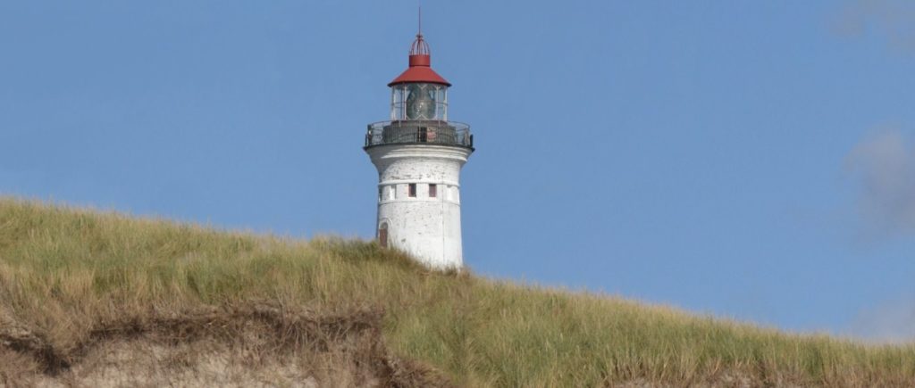 Familienurlaub in Dänemark am Ostsee Strand Leuchtturm